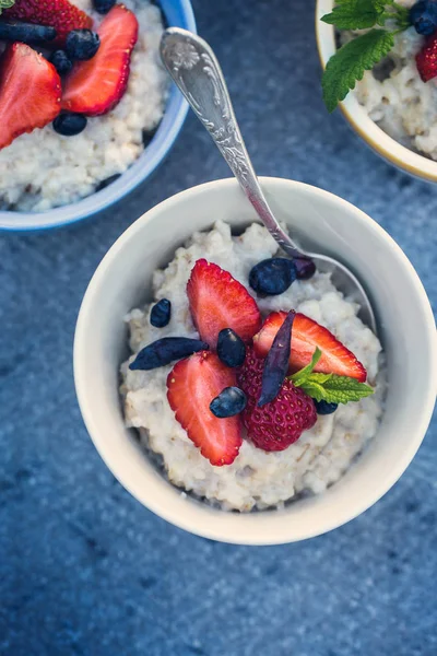 Family breakfast with honeysuckle berries — Stock Photo, Image