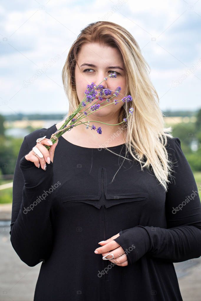 woman sniffing lavender