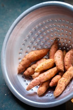 Turuncu tatlı patates kevgir, yakın çekim