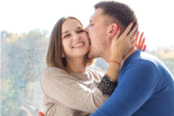 The guy bites the girl — Stock Photo, Image