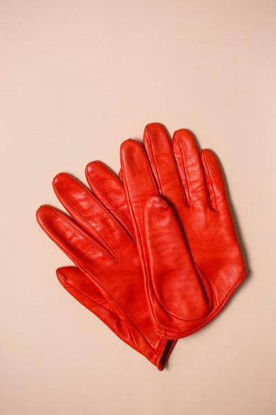 Bright orange gloves made of genuine leather — Stock Photo, Image
