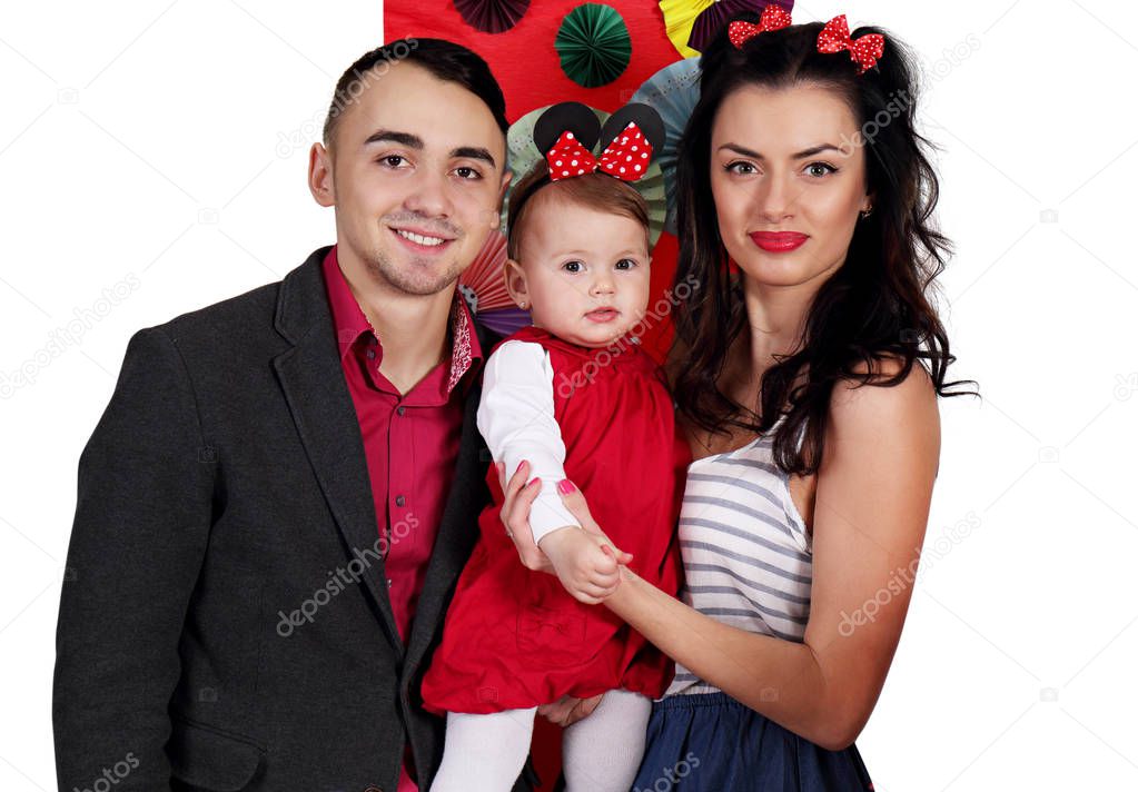 Young family celebrating the first day of the birth of daughter