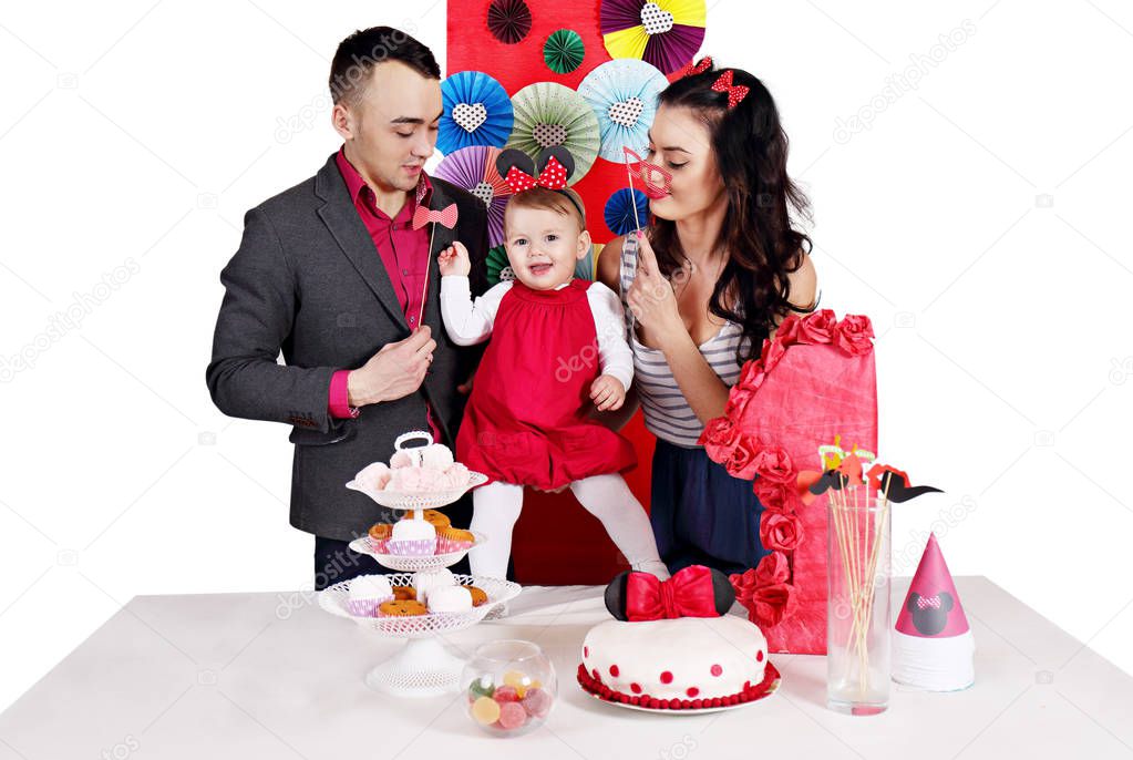 Young family celebrating the first day of the birth of daughter