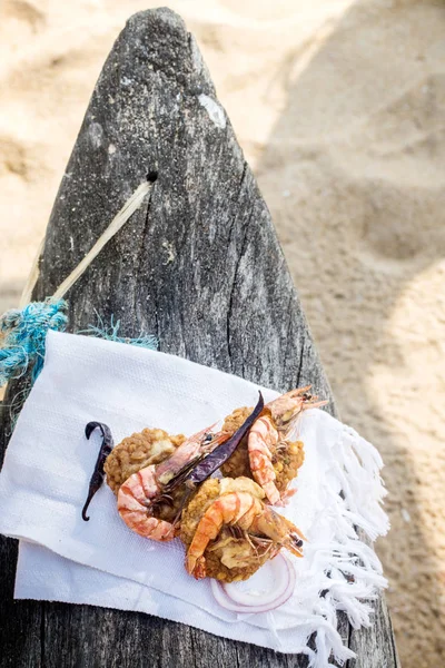 shrimp with a bean patch on the shore of the ocean