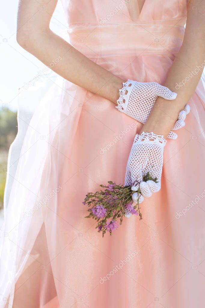Woman in lacy white gloves handmade in retro style
