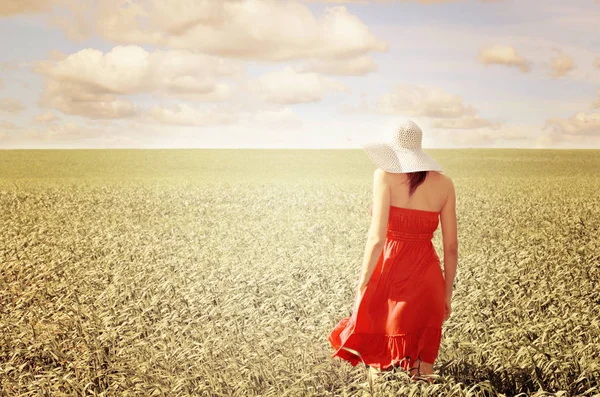 Woman Big Hat Spring Field Stock Image
