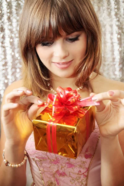 Young Woman Opens Box Gift — Stock Photo, Image