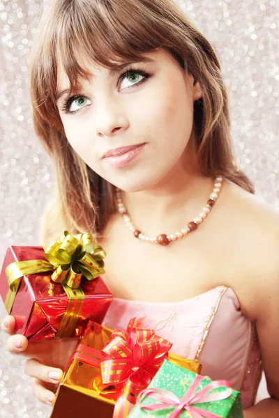 Dreamy Beautiful Girl Holds Holiday Gifts — Stock Photo, Image