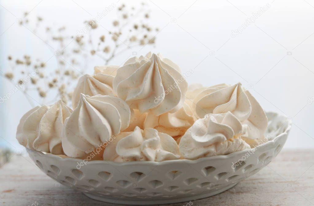 Light crunchy dessert, meringue on the plate