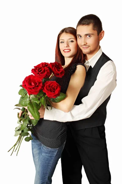 若いカップルの花束と白い背景の上のローズ — ストック写真