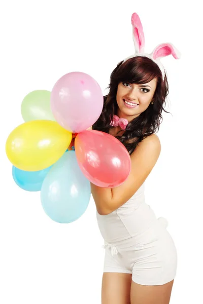 女人打扮成一只兔子持有气球 — 图库照片