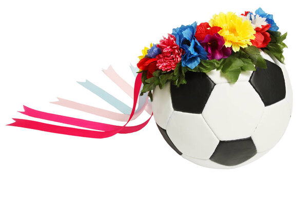 soccer ball in the Ukrainian wreath with ribbons