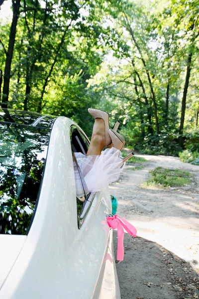 Bride Put Legs Car Window Tinted — Stock Photo, Image