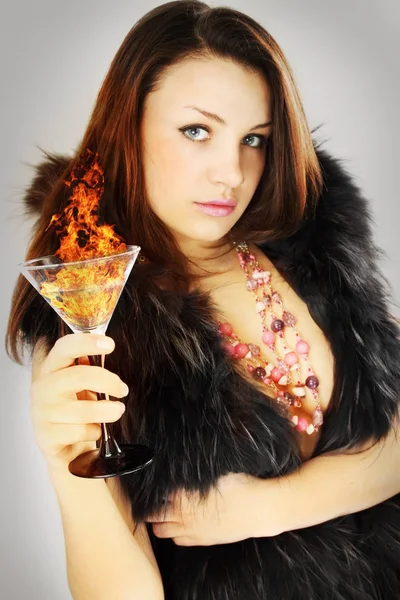 Beautiful Woman Holds Glass Flaming Drink — Stock Photo, Image