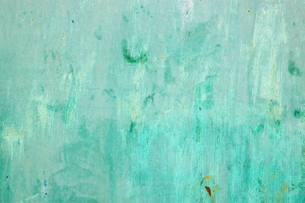 金属表面に青緑色のひびの入った塗料 — ストック写真