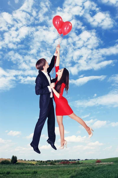 Man Woman Flying Balloons Sky Royalty Free Stock Images