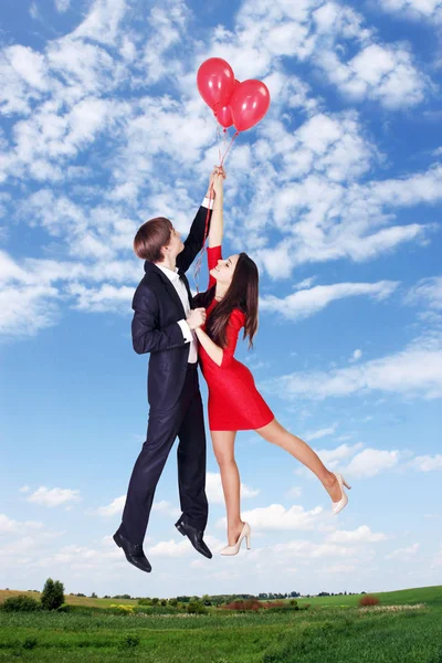Man Woman Flying Balloons Sky Stock Picture
