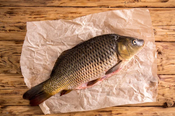 Peeled Fresh Carp Parchment Top View — Stock Photo, Image