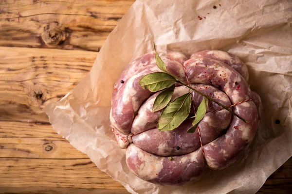 Homemade sausage on paper — Stock Photo, Image