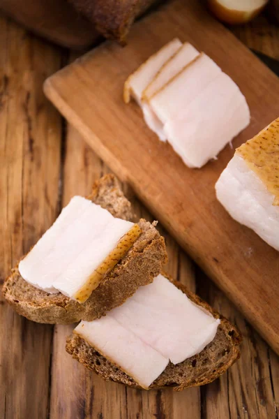 Sandwich with bacon on the board — Stock Image Sandwich with bacon on the board Royalty Free Stock Photos