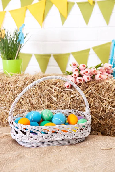 Big basket with Easter colorful eggs — Stock Photo, Image