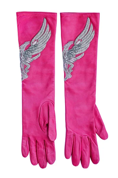 Розовые длинные перчатки с вышитой серебром феникс — стоковое фото