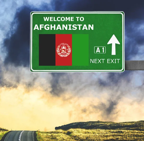 Afghanistan road sign against clear blue sky