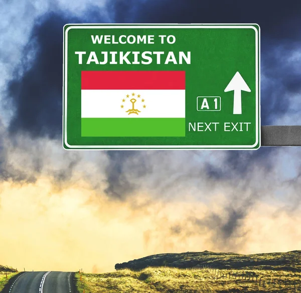 Tajikistan road sign against clear blue sky