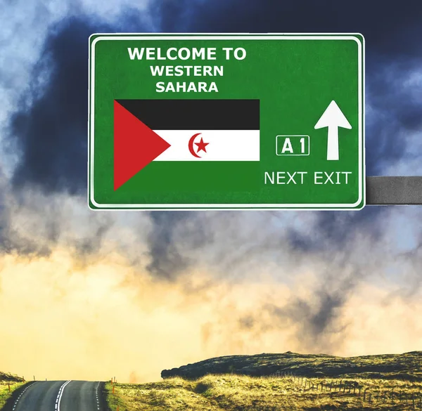 Western Sahara road sign against clear blue sky