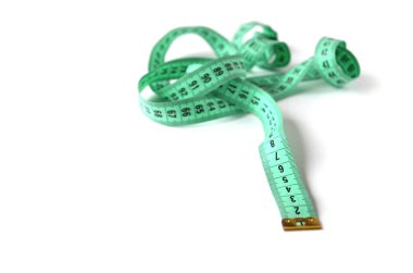 İzole yeşil beyaz arka plan kasette ölçme