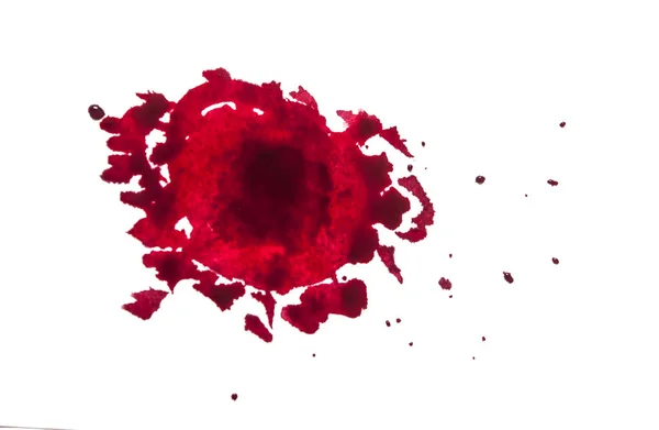 白地に赤いペンキ滴のクローズ アップ — ストック写真