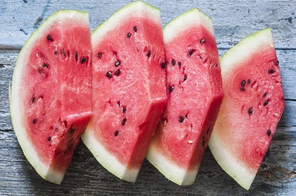 Wassermelonenscheiben Auf Rustikalem Holzhintergrund Draufsicht — Stockfoto