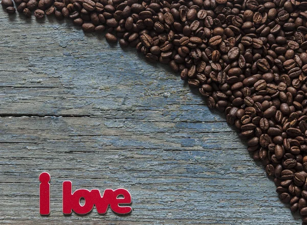 サンプル テキストのウッドの背景領域のクローズ アップ コーヒー豆 — ストック写真