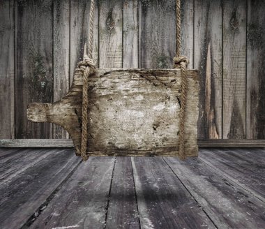 Karanlık grungy Oda ve bir kopya alanı üzerinde asılı eski ahşap afiş
