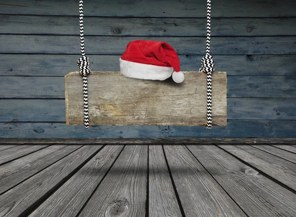 Altes Hölzernes Banner Mit Weihnachtsmütze Das Einem Dunklen Grungy Raum — Stockfoto