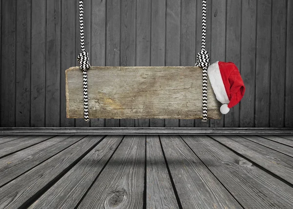 Oude Houten Banner Met Kerstmuts Opknoping Een Donkere Grungy Kamer — Stockfoto