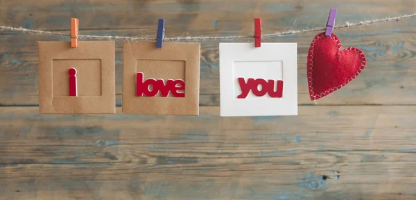 Instant Photo Hanging Clothesline Words Love You Old Wood Background — Stock Photo, Image