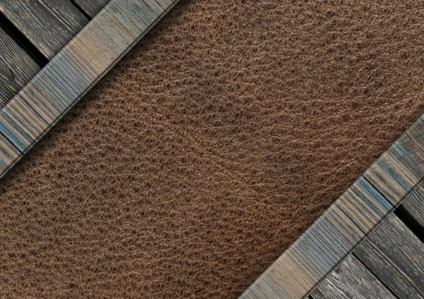 古い木製の板に囲まれた革バック グラウンド — ストック写真