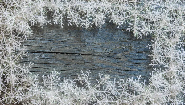 Fondo Navidad Con Copos Nieve Sobre Textura Madera —  Fotos de Stock