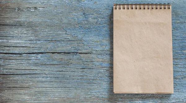 Open Notepad Spiral Dark Brown Wooden Table Top View — Stock Photo, Image