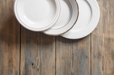 Ahşap arka plan boş plaka. Metin alanı olan üstten görünüm