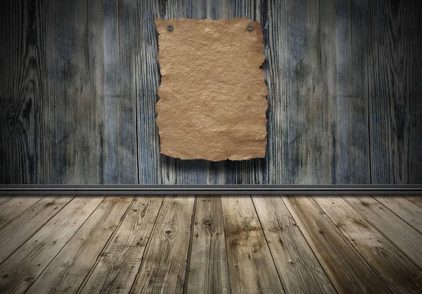 Cartaz de papel velho na parede vintage de madeira — Fotografia de Stock