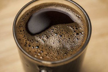 Kahve köpüğü aşırı kapatın. Makro doku ve arka plan