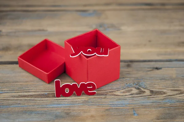 gift box on wood table background with copy space