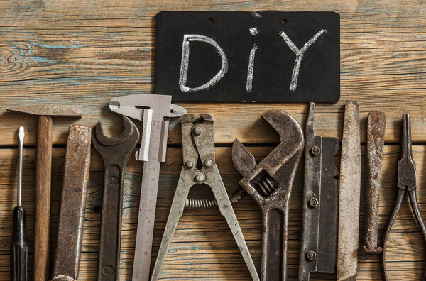 Flat lay with different carpentry tools set of hand tools and le