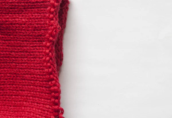 Röd stickad mönster ull tröja textur närbild. Handgjorda röd — Stockfoto
