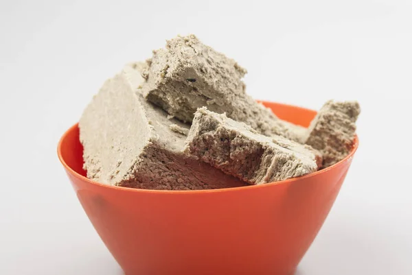 The halva on a white background. — Stock Photo, Image