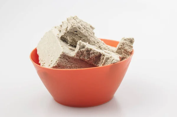 The halva on a white background. — Stock Photo, Image