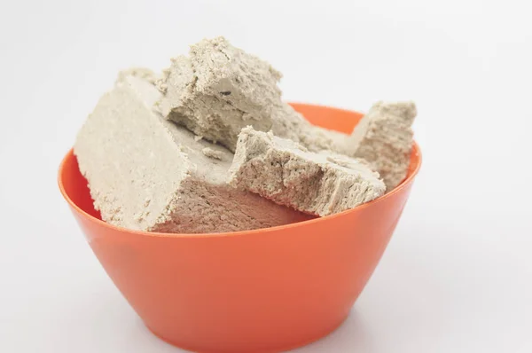 The halva on a white background. — Stock Photo, Image