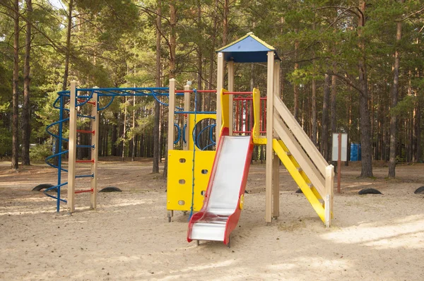 Kids playground in the forest — Stock Photo, Image